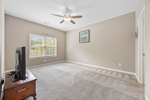 103 Teal Ct, Myrtle Beach, SC 29588 - unfurnished living room featuring a ceiling fan, baseboards, and carpet floors