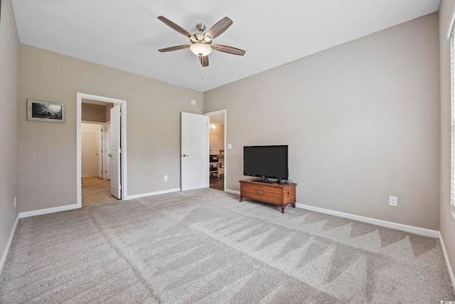 103 Teal Ct, Myrtle Beach, SC 29588 - unfurnished bedroom featuring light colored carpet, baseboards, ceiling fan, and connected bathroom