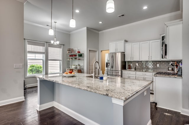 1286 Culbertson Ave, Myrtle Beach, SC 29577 - kitchen with appliances with stainless steel finishes, dark wood-type flooring, white cabinetry, backsplash, and crown molding