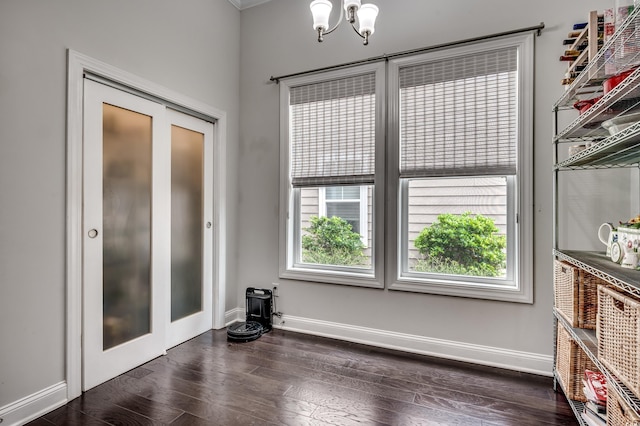 1286 Culbertson Ave, Myrtle Beach, SC 29577 - unfurnished dining area featuring healthy amount of natural light, dark wood finished floors, and a chandelier