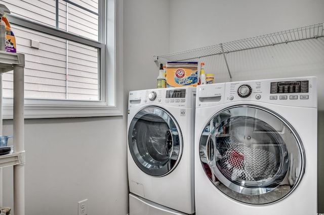 1286 Culbertson Ave, Myrtle Beach, SC 29577 - laundry room featuring washer and clothes dryer and plenty of natural light