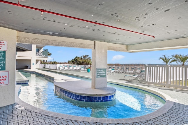 community pool with fence