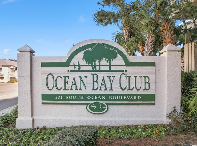 view of community sign