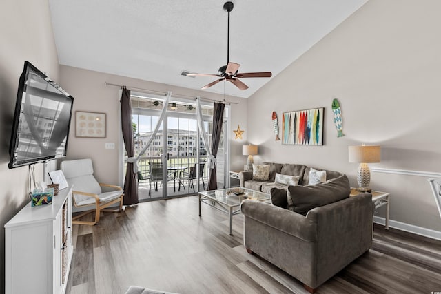 5751 Oyster Catcher Dr Unit 334, North Myrtle Beach, SC 29582 - living area with vaulted ceiling, a ceiling fan, and wood finished floors