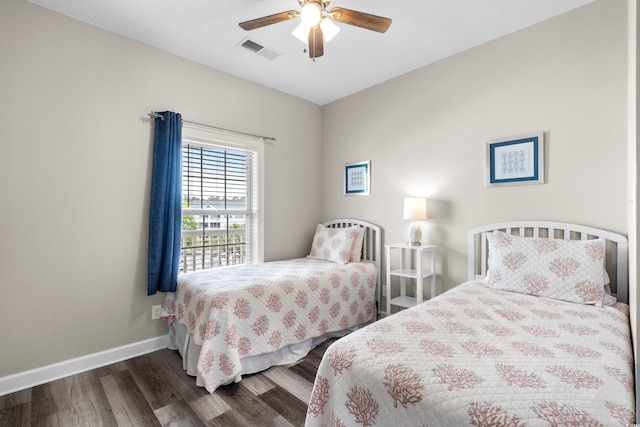 5751 Oyster Catcher Dr Unit 334, North Myrtle Beach, SC 29582 - bedroom with wood finished floors and ceiling fan