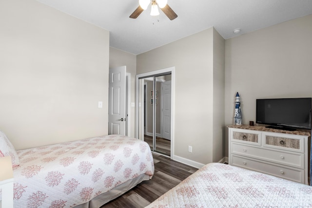 5751 Oyster Catcher Dr Unit 334, North Myrtle Beach, SC 29582 - bedroom with dark wood-style flooring, a closet, and a ceiling fan