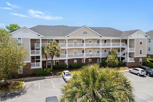 5751 Oyster Catcher Dr Unit 334, North Myrtle Beach, SC 29582 - view of property with uncovered parking