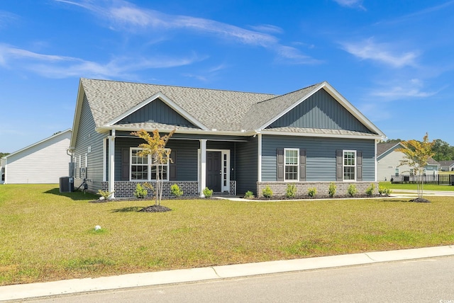383 Hayloft Cir, Conway, SC 29526 - craftsman house with board and batten siding, brick siding, a front yard, and covered porch