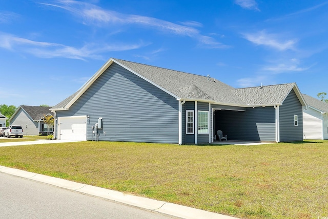 383 Hayloft Cir, Conway, SC 29526 - view of side of home featuring a garage, a lawn, concrete driveway, and roof with shingles