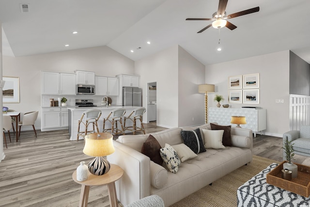 383 Hayloft Cir, Conway, SC 29526 - living area featuring a ceiling fan, light wood finished floors, high vaulted ceiling, baseboards, and recessed lighting