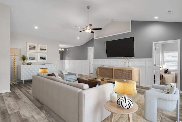 383 Hayloft Cir, Conway, SC 29526 - living room with a ceiling fan, light wood-style flooring, high vaulted ceiling, recessed lighting, and wainscoting