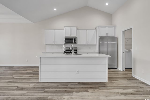 383 Hayloft Cir, Conway, SC 29526 - kitchen featuring appliances with stainless steel finishes, a sink, light countertops, white cabinetry, and recessed lighting