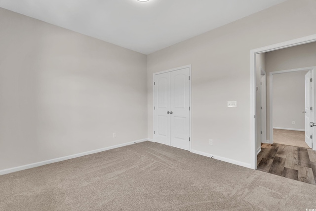 383 Hayloft Cir, Conway, SC 29526 - unfurnished bedroom featuring carpet, baseboards, and a closet