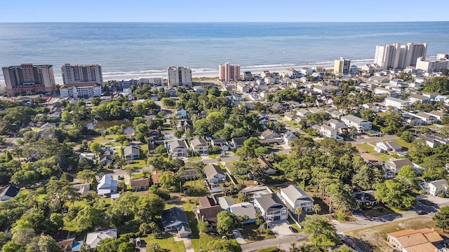 aerial perspective of suburban area featuring a pool