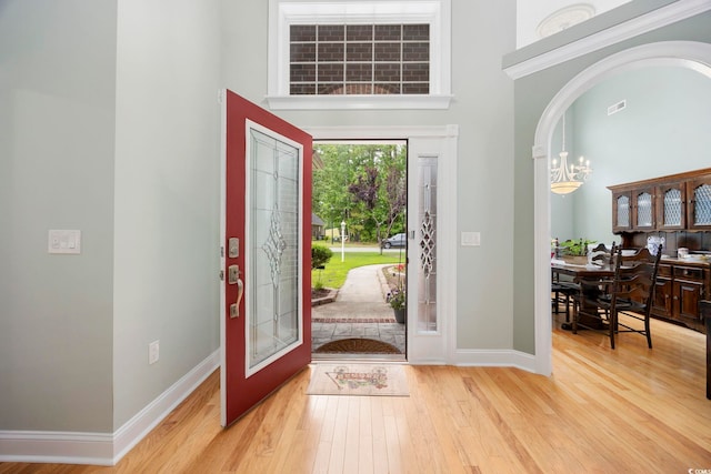 180 Waterhall Dr, Murrells Inlet, SC 29576 - entryway with a towering ceiling, light wood-style floors, baseboards, and french doors