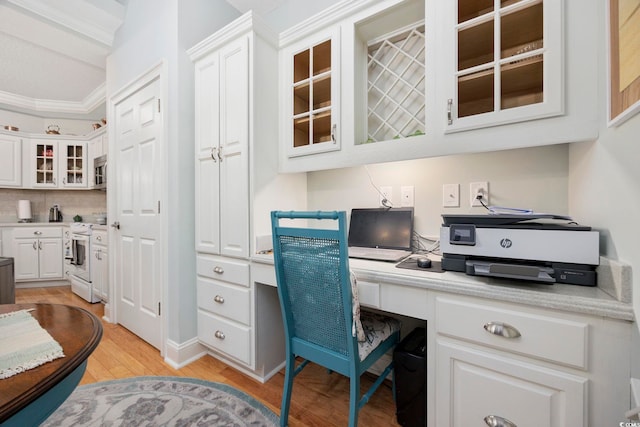 180 Waterhall Dr, Murrells Inlet, SC 29576 - office with built in study area, light wood-style floors, and crown molding