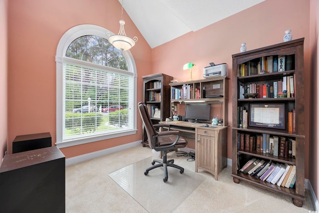 180 Waterhall Dr, Murrells Inlet, SC 29576 - home office with vaulted ceiling, light carpet, and baseboards