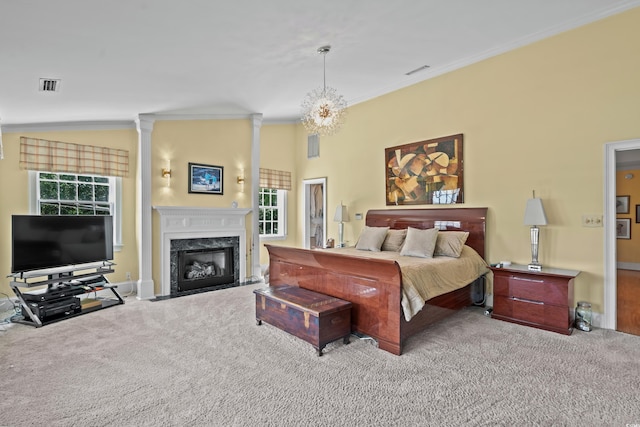 4003 N Ocean Blvd, Myrtle Beach, SC 29577 - carpeted bedroom featuring a premium fireplace, ornamental molding, baseboards, and visible vents