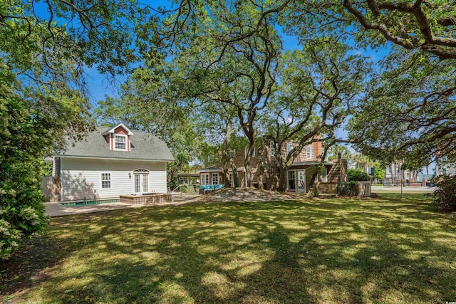 4003 N Ocean Blvd, Myrtle Beach, SC 29577 - view of yard featuring fence, french doors, and an outdoor pool