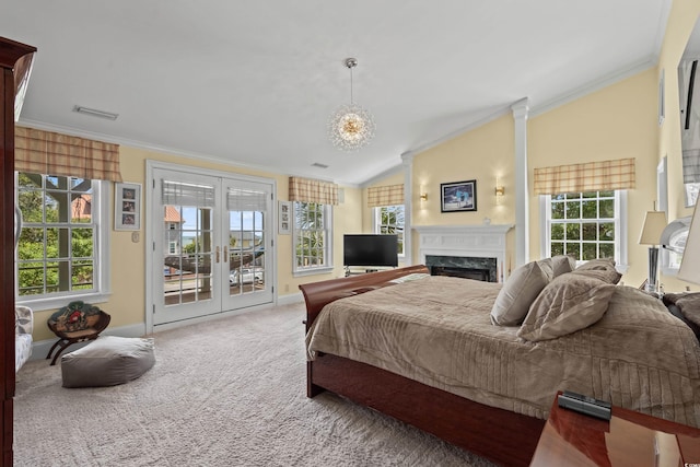 4003 N Ocean Blvd, Myrtle Beach, SC 29577 - bedroom featuring lofted ceiling, french doors, a fireplace, carpet floors, and access to exterior