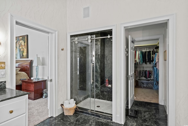 4003 N Ocean Blvd, Myrtle Beach, SC 29577 - ensuite bathroom featuring a stall shower, marble finish floor, baseboards, and ensuite bath