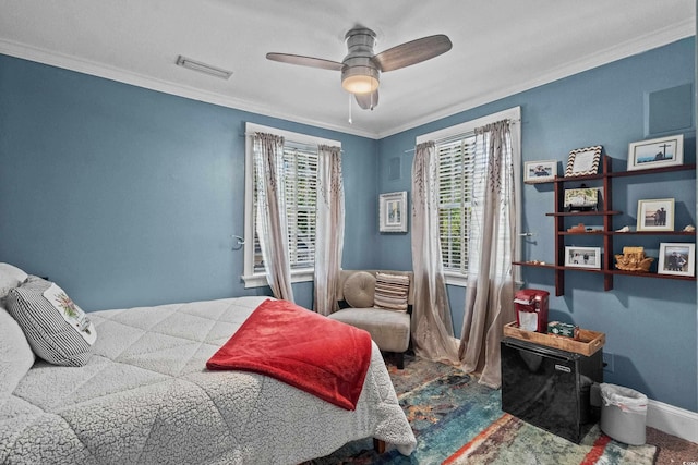4003 N Ocean Blvd, Myrtle Beach, SC 29577 - bedroom with visible vents, baseboards, a ceiling fan, and ornamental molding