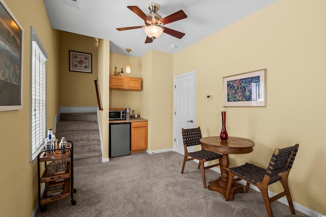 4003 N Ocean Blvd, Myrtle Beach, SC 29577 - interior space featuring baseboards, stairway, ceiling fan, and light colored carpet