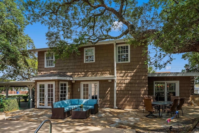 4003 N Ocean Blvd, Myrtle Beach, SC 29577 - rear view of property with a patio, french doors, and outdoor lounge area