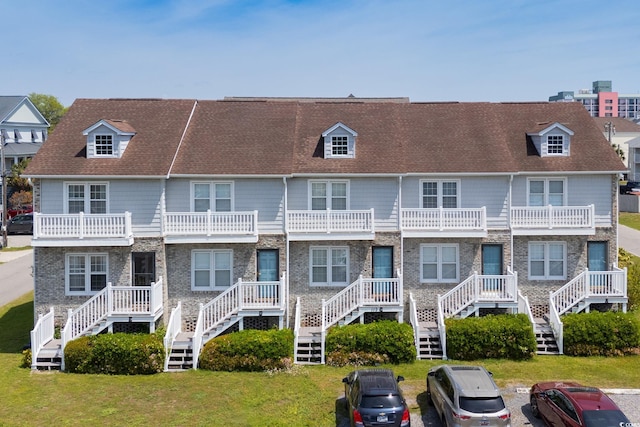 112 3rd Ave S Unit B, Surfside Beach, SC 29575 - view of building exterior with stairs
