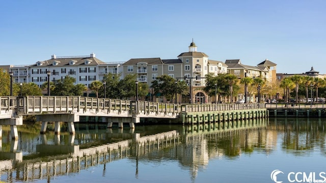 dock area featuring a water view