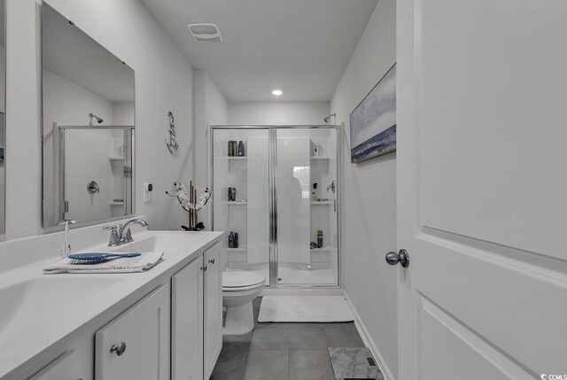 528 Courtridge Loop, Conway, SC 29526 - bathroom featuring toilet, a stall shower, double vanity, tile patterned floors, and recessed lighting