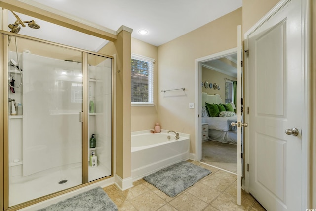 full bathroom with a bath, ensuite bathroom, a shower stall, and baseboards