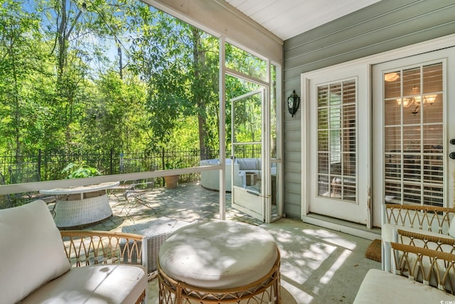sunroom featuring plenty of natural light