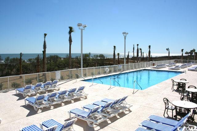 5300 N Ocean Blvd Unit 518, Myrtle Beach, SC 29577 - community pool featuring fence and a patio area