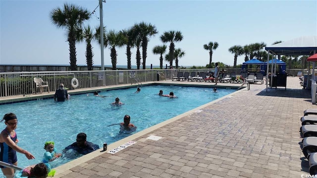 5300 N Ocean Blvd Unit 518, Myrtle Beach, SC 29577 - community pool with fence and a patio area