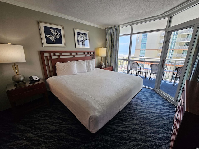 5300 N Ocean Blvd Unit 518, Myrtle Beach, SC 29577 - bedroom with dark colored carpet, ornamental molding, access to exterior, expansive windows, and a textured ceiling