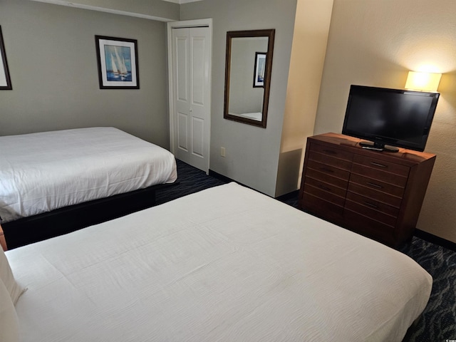 5300 N Ocean Blvd Unit 518, Myrtle Beach, SC 29577 - bedroom featuring a closet and baseboards