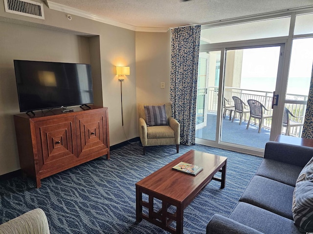 5300 N Ocean Blvd Unit 518, Myrtle Beach, SC 29577 - living area featuring ornamental molding, carpet flooring, plenty of natural light, and a textured ceiling