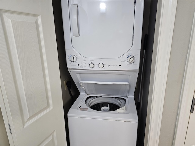 5300 N Ocean Blvd Unit 518, Myrtle Beach, SC 29577 - washroom featuring stacked washer and clothes dryer