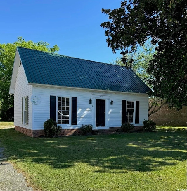 207 E Bobby Gerald Pkwy, Marion, SC 29571 - view of front of home featuring a front lawn and metal roof