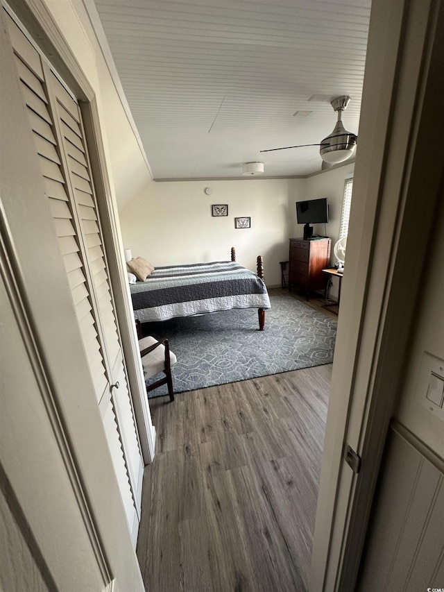 207 E Bobby Gerald Pkwy, Marion, SC 29571 - bedroom featuring wood finished floors, vaulted ceiling, and a ceiling fan