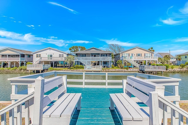 view of pool featuring a residential view and a water view
