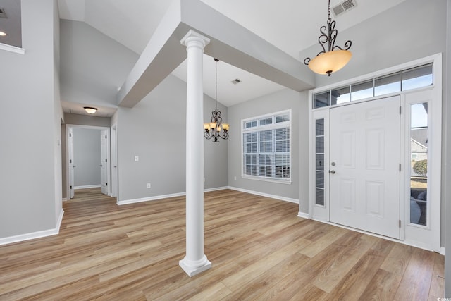 229 Duchess Ct, Myrtle Beach, SC 29588 - entryway with high vaulted ceiling, light wood finished floors, a chandelier, and baseboards