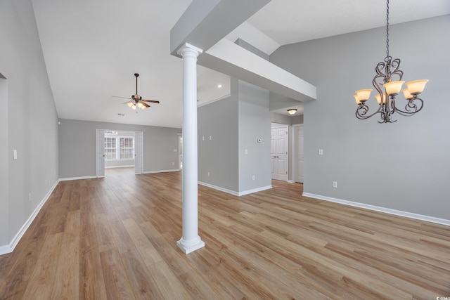 229 Duchess Ct, Myrtle Beach, SC 29588 - unfurnished living room featuring ceiling fan, a chandelier, light wood finished floors, baseboards, and high vaulted ceiling