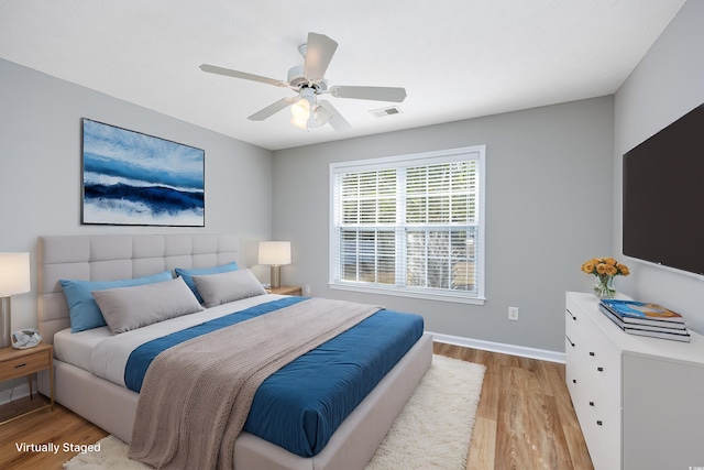 229 Duchess Ct, Myrtle Beach, SC 29588 - bedroom with light wood finished floors, baseboards, and ceiling fan