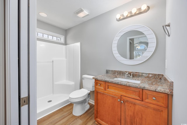 229 Duchess Ct, Myrtle Beach, SC 29588 - bathroom featuring wood finished floors, toilet, a shower, vanity, and baseboards