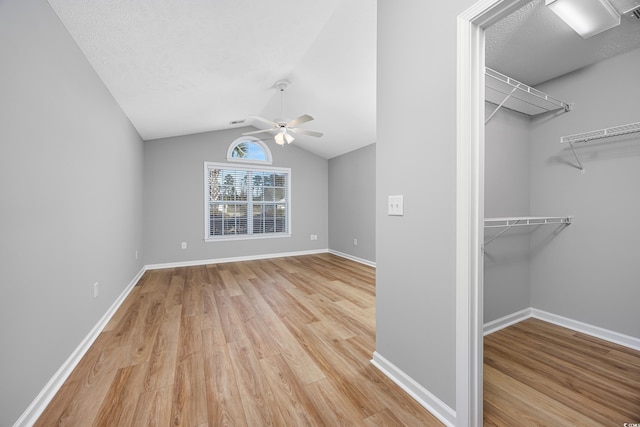 229 Duchess Ct, Myrtle Beach, SC 29588 - walk in closet with light wood finished floors, a ceiling fan, and lofted ceiling