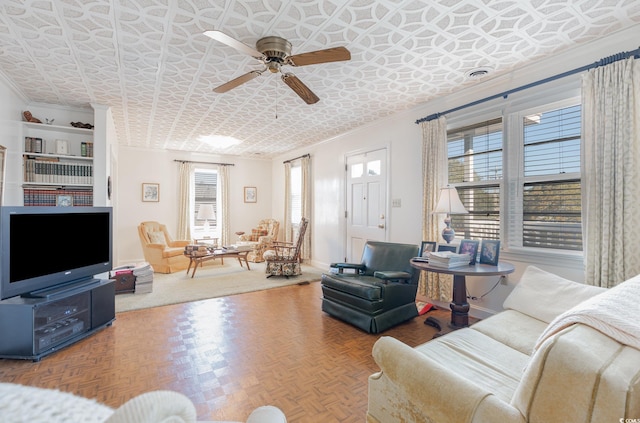 215 28th Ave S, Myrtle Beach, SC 29577 - living area with an ornate ceiling, ornamental molding, baseboards, and a ceiling fan