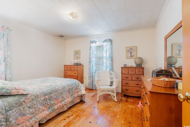 215 28th Ave S, Myrtle Beach, SC 29577 - bedroom featuring ornamental molding and light wood-style flooring