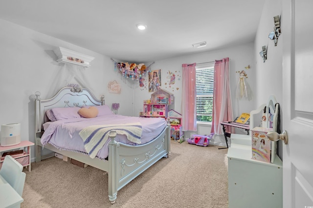 carpeted bedroom with recessed lighting